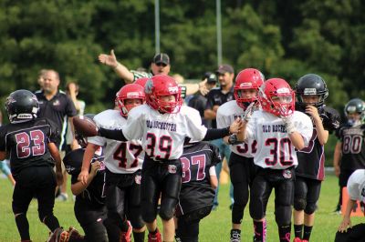 Old Rochester Youth Football
It was a great day for all of the Bulldog divisions in the home opener for Old Rochester Youth Football vs. East Bay on Sunday. Tiny Mites won 18-12, junior pee wees 31-7, pee wees 28-6 and JV 14-6. Photos courtesy of ORYF. 

