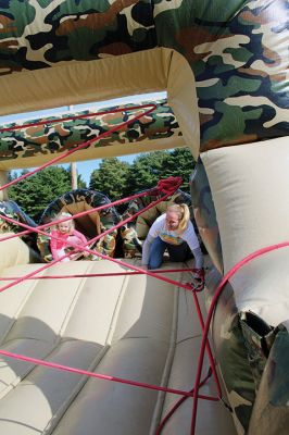 Old Colony Regional Vocational-Technical High School Parent-Teacher Organization
The Old Colony Regional Vocational-Technical High School Parent-Teacher Organization held its annual Fall Family Festival on Saturday at its athletic fields in Rochester. The Boy Scouts were on hand to offer activities, and of particular fun for visitors was an extra-large, military-style inflatable obstacle course. Photos by Mick Colageo
