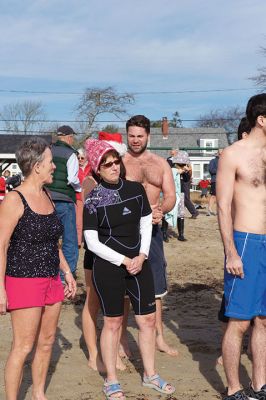 14th Annual Christmas Day Swim
The Helping Hands and Hooves 14th Annual Christmas Day Swim got a helping hand from the unseasonably warm weather, drawing in roughly 80 participants who took the polar plunge to support the organization’s therapeutic horseback riding program for adults with special needs. Photos by Colin Veitch
