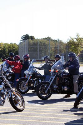 Poker Run
Motorcyclists gathered Sunday morning, September 20, in the parking lot of ORR to ride in the third annual Poker Run for Alex Pateakos. Alex is a five-year-old Marion boy who suffers from Spinal Muscular Atrophy. Money raised by the poker run will benefit Alex, and Families of SMA, a group that helps families like the Pateakos live their lives as close to normal as possible. The Poker Run covered 65 miles and ran through Lakeville, Carver, East Wareham, and back to ORR. Photo by Anne O'Brien-Kakley
