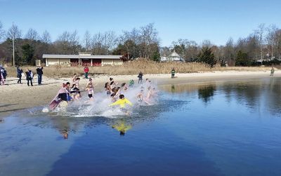 Tabor takes the Plunge!
Tabor takes the Plunge! Tabor Academy students and faculty raced towards the icy waters off Silvershell beach on December 9 for a Polar Plunge, raising funds for the Special Olympics. Photos by Wayne 
