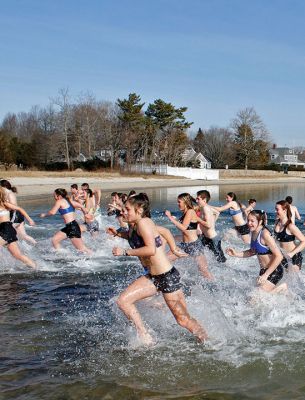 Tabor Academy Polar Plunge
Tabor Academy hosted its second annual Polar Plunge on Sunday, January 21 at Silvershell Beach to raise money for the school’s Special Olympics Young Athletes Program. Students from ‘fundraising rival’ Sandwich High also showed up, with scores of students and staff making a dash in and quickly out of the chilly waters. The plunge raised about $8,000. Photos by Deina Zartman
