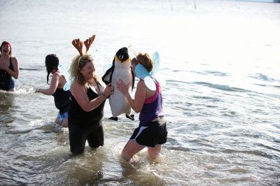 Making a Splash!
Making a Splash! Over 100 participants took the icy plunge into the frigid waters at Mattapoisett Town Beach on January 1 during the annual Freezin’ for a Reason Polar Plunge on New Year’s Day. Proceeds go to benefit the BAM Foundation, a local charity that fundraises to provide financial assistance to people who are facing cancer treatment. Photos by Colin Veitch
