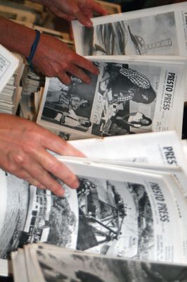 Presto Press
A partnership between the Mattapoisett Historical Society and the public library allowed the sale of duplicate issues of the Presto Press, which was printed from the 1950s until the early 1990s. People poured over the stacks seeking a specific issue or year to take home for their personal archives. The monies raised will be used to defray the cost of storing the publications in a climate-controlled space. Photos by Marilou Newell
