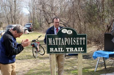 Rail Trail
Bill Straus, State Representative, Steve Kelleher, Chairman of Mattapoisett Rail Trail, and Jordan Collyer, Vice-Chairman of the Mattapoisett Board of Selectman (left to right) cut the ribbon to open the Inauguration of the Mattapoisett Rail Trails Old Colony Mile. Photo by Sarah K. Taylor. 
