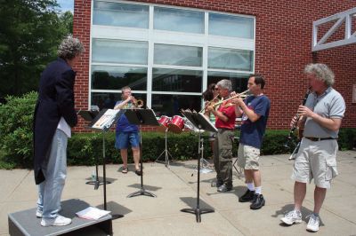 Summer Serenade 
Teachers sang and played instruments at Rochester Memorial School on June 18, 2010, the last day of school, as students waved goodbye from their school buses. Photo by Laura Pedulli.
