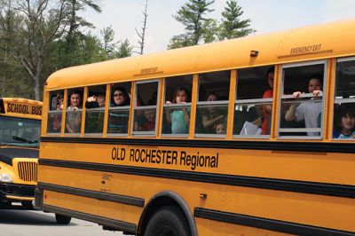 Last Day of School
June 19 was the last day of school at RMS, and the teachers and staff celebrated with their traditional student sendoff. Conductor Danni Kleiman led the teachers in song as the busses full of waving students looped around the parking lot before heading off toward summer break. Photos by Jean Perry

