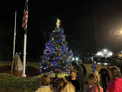 Rochester Tree Lighting
Santa was in Rochester last weekend! Both Santa and the Grinch were present, along with residents of the Tri-Town to take part in Rochester’s tree lighting on November 30. The rain was heavy but the hearts light. Photo by Michael J. DeCicco
