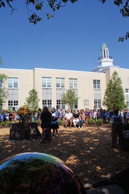 Children’s Memorial Garden
Where for many years stood a tall spruce tree at Sippican Elementary School is now a large stump at the center of a newly dedicated Children’s Memorial Garden honoring the lives of former students Marques Sylvia, Andrew Rego, Alexis Wisner and Cory Jackson. On June 14, Principal Marla Sirois led a celebration of the vision of former Principal Marylou Hobson (1990-2004) and the generosity and effort of Steve Gonsalves, Suzanna Davis, Margie Baldwin and the Pythagorean Lodge. Photos by Mick Colageo
