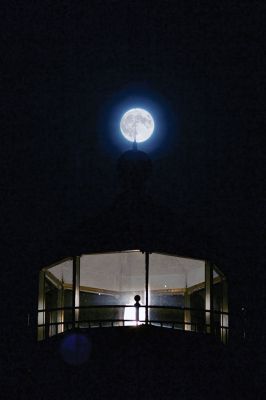 Supermoon Eclipse
A blood red Harvest Moon hangs above Ned’s Point in Mattapoisett where some people had a stellar view of the rare celestial event of a total lunar eclipse of a supermoon. Dozens came to watch the moon on Sunday night as it passed through the Earth’s shadow between 9:07 pm, when the partial eclipse began, and 12:27 am when the spectacle ended. Photo by Colin Veitch
