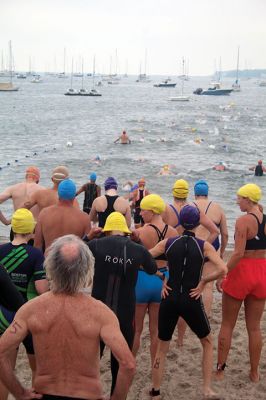 Mattapoisett Lions Club Triathlon
Emily Tato was grateful to Aner Larreategi after their top-three-overall performances in Sunday’s Mattapoisett Lions Club Triathlon. Pushed from start to finish by Larreategi, Tato was the fastest woman in all three events, the swim, bike and run. Don Cuddy was the 70-and-over winner. Photos by Mick Colageo
