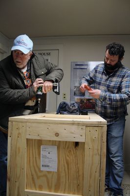 Whale Bark Wanderer
Mattapoisett Museum Curator Connor Gaudet and volunteer Bob Clifford unpack the custom model of the Whale Bark Wanderer 1878 recreated by artist George Lowery from scratch and donated to the museum. The model arrived on Tuesday afternoon from Arizona in a crate weighing a total of 181 pounds. The model joins two other models of the famous whaling ship in the museum, including a model built and donated by John D. Young. Photos by Mick Colageo
