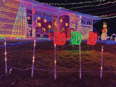 Christmas Lights
Marino Carreiro has once again illuminated Acushnet Road with his impressive winter lights display. Having worked for the last few months, the Carreiros flipped the switch and turned the lights on last Saturday. The spectacle, along with hot chocolate and treats, is visible now through the holiday season. Photos by Sam Bishop
