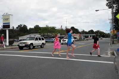 SCC Car Wash
The SouthCoast Children’s Chorus – along with parents and patrons – scrubbed for bucks during a car wash at the Mattapoisett Fire Station on Saturday afternoon, raising money for their general fund with a busy performance schedule coming up. “We hold fundraisers to support the work, the growth, and the performances of the Chorus,” Artistic Director Leslie Piper said. “We want every child to be able to sing, so we offer tuition scholarships for those who need them.” Photo by Shawn Badgley.
