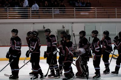 ORR Hockey
On Saturday, January 19, the Old Rochester Regional Varsity Ice Hockey Team ventured to the John Gallo Ice Arena in Bourne to face off against the Wareham Vikings.  Members of the ORR team check out the scoreboard, which was quite active all night.  The official score for the game was 12-2 in ORR’s favor, however, the scoreboard stopped keeping score at 8-2 due to the landslide victory.  The win marked ORR’s sixth of the season, while the Vikings haven’t recorded a win yet.  Photo by Felix Perez.
