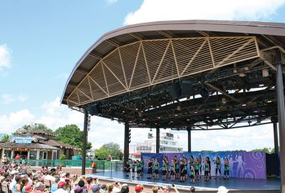 Showstoppers at Disney
The Showstoppers – the Tri-Town’s community-service singing troupe – performed at the Waterside Stage in Downtown Disney World to a packed crowd and standing ovation on Aug. 8. The members, who range in age from 6 to 19, also participated in a Disney Performing Arts Workshop. Photo courtesy Kelly Zucco.
