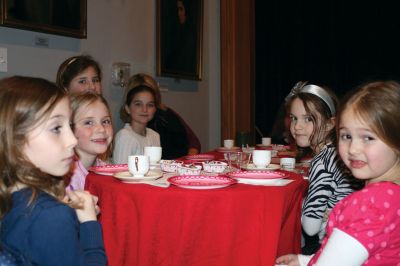 Valentine Tea
The Marion Art Center hosted an American Girl themed Valentine Tea Party on February 6, 2010. Over 20 girls dressed in their pink and red finest enjoyed dainty finger foods, festive cupcakes, red fruit punch, and tea. Morgan Middleton played Kirsten and Phoebe Mock played Singing Bird in the Marion Art Center American Girl mini-musical that accompanied the tea party. Photo by Anne O�Brien-Kakley.
