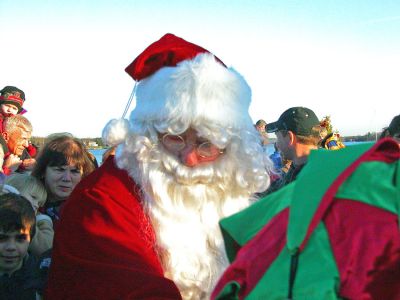 Santa in Sippican
Santa Claus arrived in Marion on Sunday, December 10 via boat in Sippican Harbor to attend the town's 2006 Annual Holiday Village Stroll. (Photo by Robert Chiarito).
