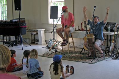 Stories and Songs
As part of the Mattapoisett Public Library's summer reading program, Davis Bates and Roger Tincknell presented a live performance called a "Multi-Cultural Celebration in Story and Song" in Reynard Hall of the Mattapoisett Congregational Church on Monday, June 25 which had kids singing and dancing to a variety of songs and stories. (Photo by Kenneth J. Souza).

