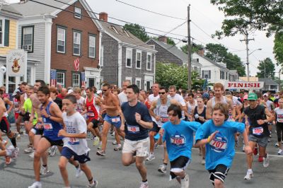 Mattapoisett Road Race 2008
A record-breaking 1,000 entrants -- some of whom are pictured here at the starting line -- registered for the 2008 running of the Mattapoisett Road Race held on July 4. (Photo by Kenneth J. Souza).
