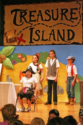 OHS Treasure Island
The Old Hammondtown School Drama Club presented a musical adaptation of the classic Robert Louis Stevenson tale, Treasure Island, on Thursday evening, April 17 before an audience of several hundred people in the Mattapoisett schools auditorium. The show was directed by ORR High School student Chelsie Nectow, who recently starred in the ORR Drama Clubs production of Evita, and featured over 50 Old Hammondtown students. (Photo by Robert Chiarito).

