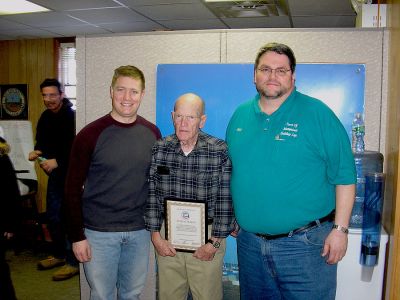 Inspector Honored
Longtime Mattapoisett Gas Inspector and Assistant Plumbing Inspector Peter B. Perkins celebrated 22 years of service to the Town of Mattapoisett recently during a luncheon held in his honor at the Mattapoisett Town Hall. Here he is flanked by Selectman Jordan Collyer and Building Inspector Andrew Bobola. (Photo by Ricky Pursley).
