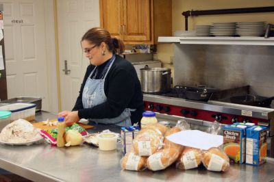 Talking Turkey
Rochester's own Pampered Chef Linda Medeiros recently returned to the Rochester Senior Center for another unique presentation. In preparation for Thanksgiving, Ms. Medeiros showed some clever ways to reuse all those turkey dinner leftovers. (Photo by Robert Chiarito).
