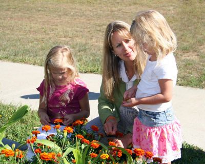 Cultivating Young Minds
Sippican School teacher Stacey Soucy has lots to show these curious youngsters about the newly-planted community garden which students and their families helped cultivate and tend over the summer. The project was part of the schools Spring Session Garden Club and produced both vegetables and flowers well into the new school year. (Photo courtesy of Jane McCarthy).
