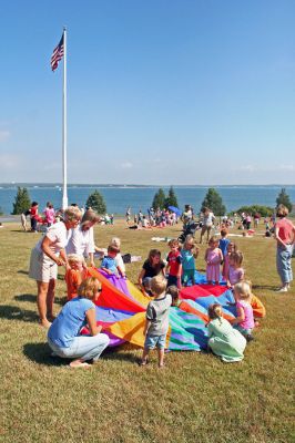 Tri-Town Teddy Bears
Children enjoyed fun in the sun during the Tri-Town Early Childhood Councils Teddy Bear Picnic held on Saturday, September 22 at the scenic Great Hill Farm in Marion. The event, designed to introduce parents to the areas early childhood programs, was held on the lawn of a castle-like mansion overlooking Buzzards Bay. (Photo by Robert Chiarito).

